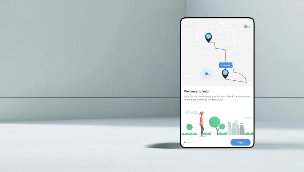 Welcome to Yulu! — onboarding screen with illustrated trees and location pin